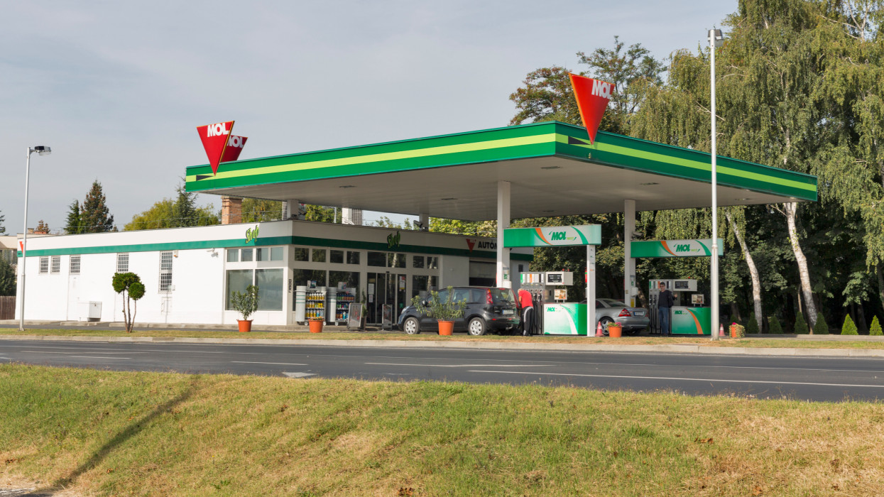 Drivers fill up their cars on MOL petrol station. MOL is Hungary and Central Europe largest oil and natural gas producer and retailer.