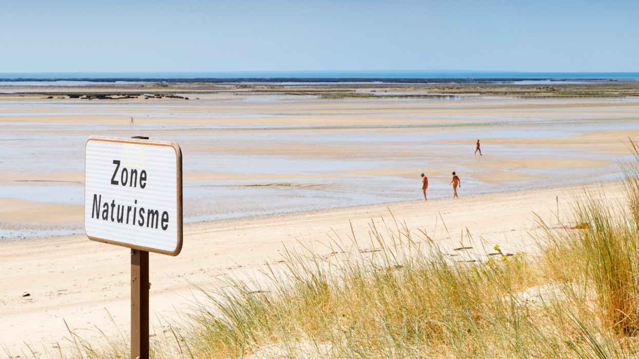 France. Normandie. Manche. Agon Coutainville. Nudist beach. Indication panel : naturist area.