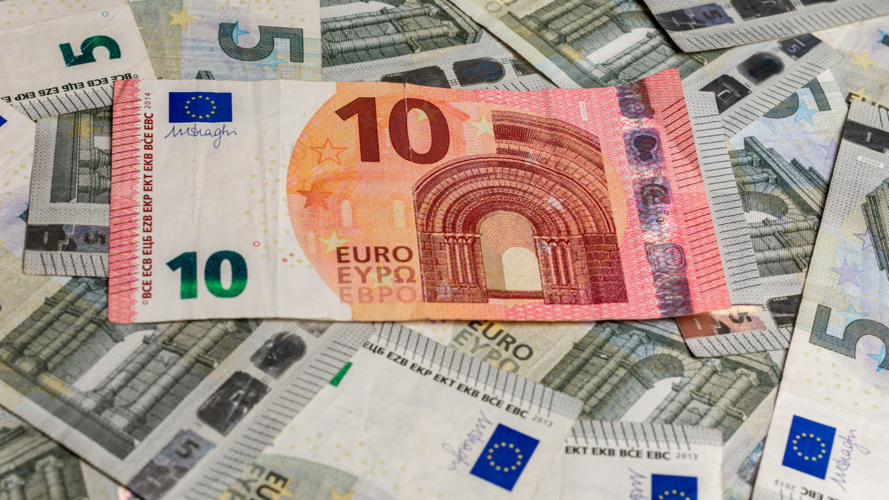 Euro banknotes, texture from 5 and 10 euros, ten euros outweigh five euros. 2019