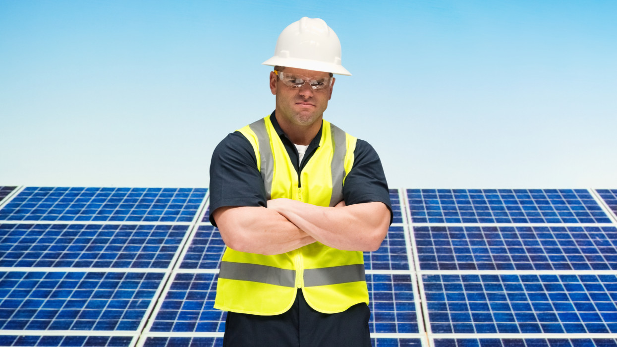 Solar worker standing outdoors