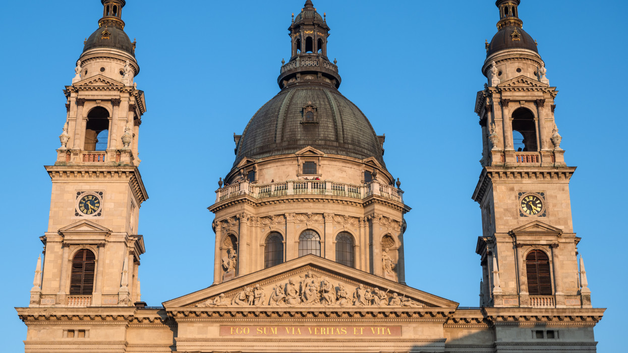 Saint Stephens Basilica in Budapest Hungary. Built between 1851 and 1905 it is the equal tallest building in the capital city. Seen in early evening glow of the sun.