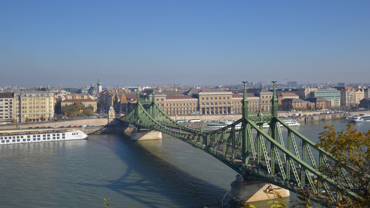 SzabadsÃ¡g hÃ­d in Budapest, Hungary, connects Buda and Pest across the River Danube. It is the third southernmost public road bridge in Budapest, located at the southern end of the City Centre.
