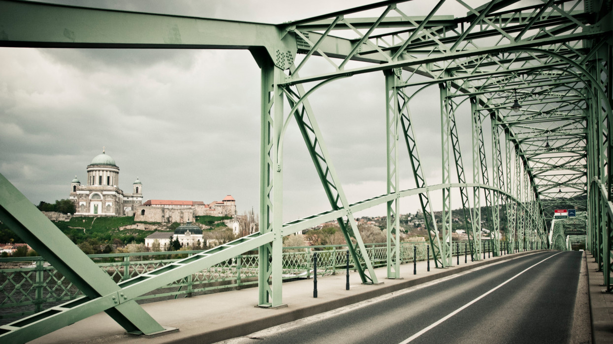 Photograph of the MÃ¡ria ValÃ©ria bridge, which is connecting Esztergom (in Hungary) with the city of Sturovo in Slovakia. The famous bridge is made of steel. It was rebuilt in 2001 with the support of the European Union. It is called in Hungarian MÃ¡ria ValÃ©ria hÃ­d and in Slovak language most MÃ¡rie ValÃ©rie.In the background, on the Hungarian side of the Danube river is the famous cathedral : Esztergom Basilica. It is the largest church in Hungary.Esztergom was the capital of Hungary from the 10th till the 13th century.This photograph was taken in spring 2011 during a journey by bicycle across Europe, Middle-East and Asia.