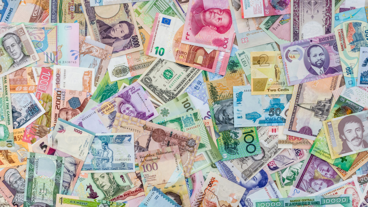 Mix of different banknotes, currency in all countries in world