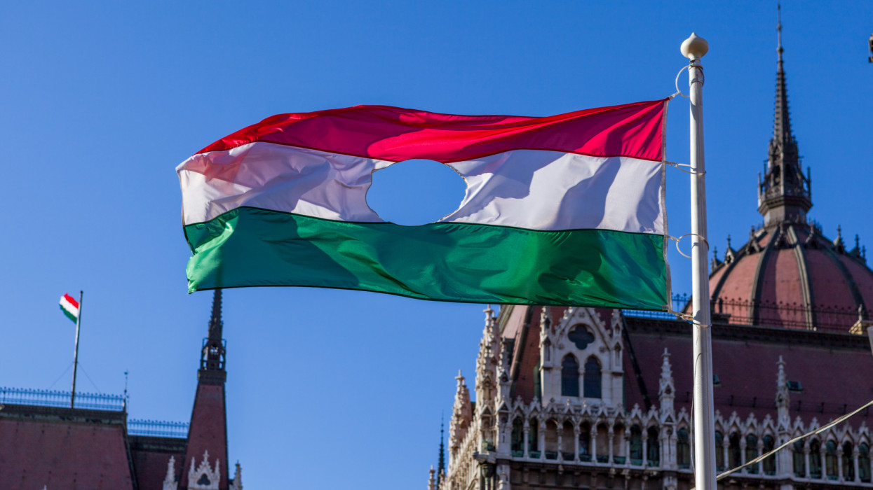 Budapest, Pest, Hungary - January 22, 2012: Flag with the Hole is the symbol of the Hungarian Revolution of 1956.