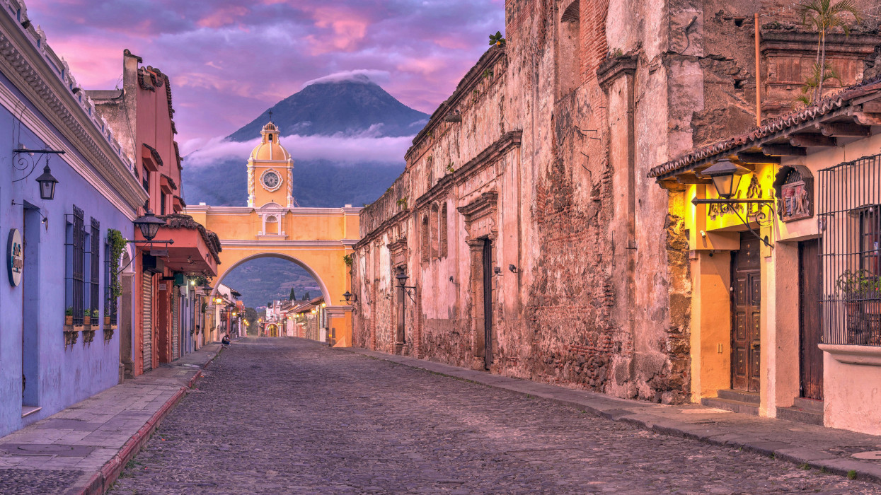 The Santa Catalina Arch is one of the main tourist landmarks in the old colonial city of Antigua, Guatemala. Antigua is a designated UNESCO World Heritage Site.
