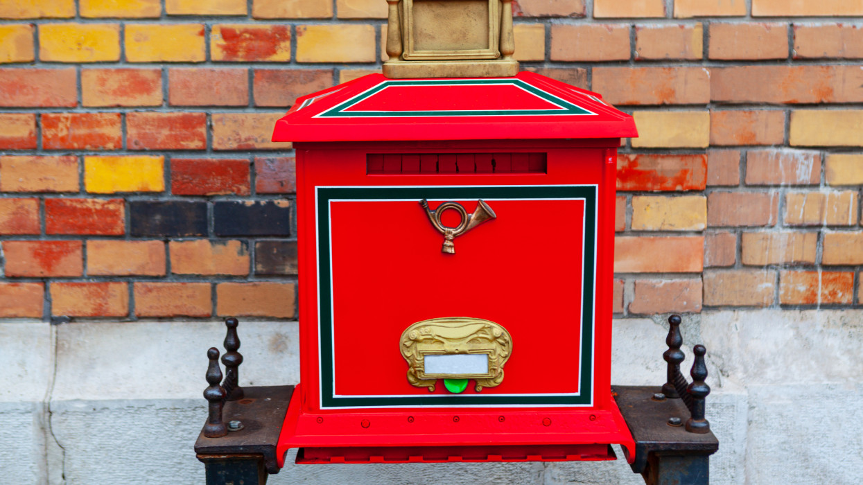 Red mailbox . Traditional postal box in Budapest Hungary