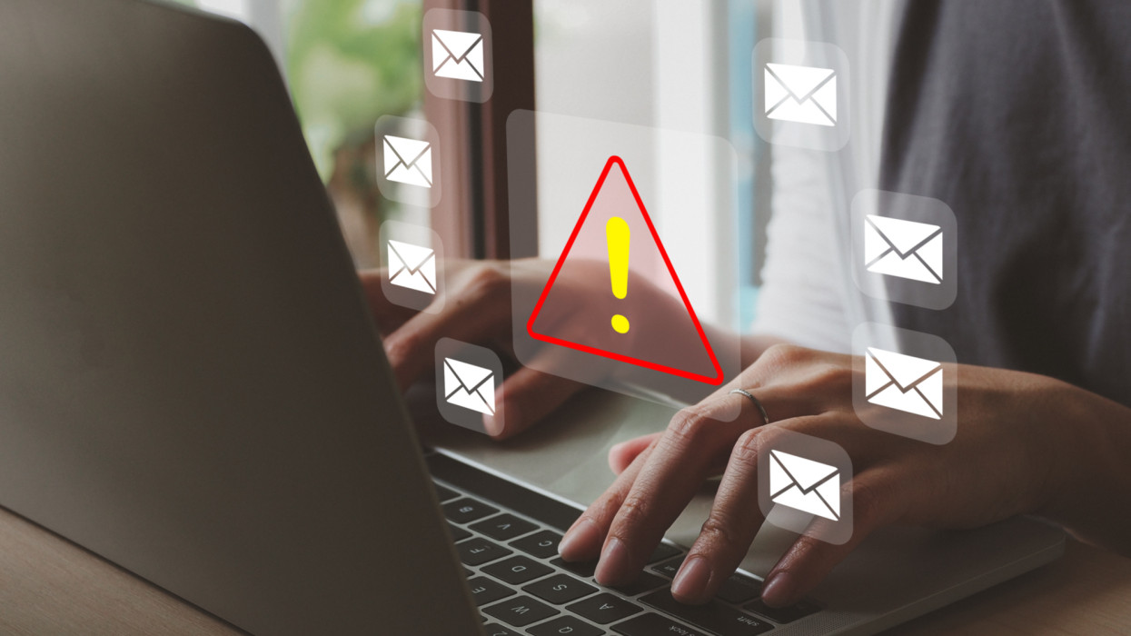 Red triangle warning sign. by email or message Show malware or virus alerts