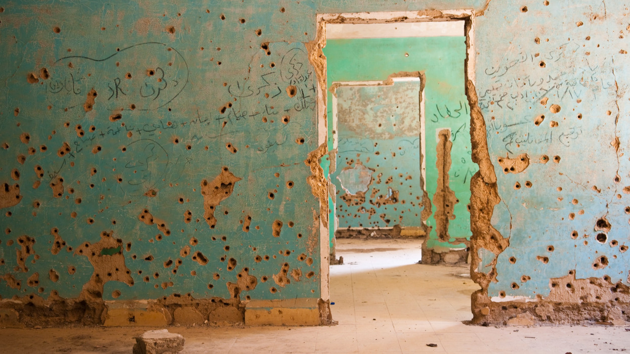 Interior view of the abandoned and bullet-scarred hospital in Quneitra, Syria. Quneitra was occupied by Israel for seven years beginning in 1967. Today, though decades have passed since the Israeli withdrawal, the town has been left in its destroyed state.