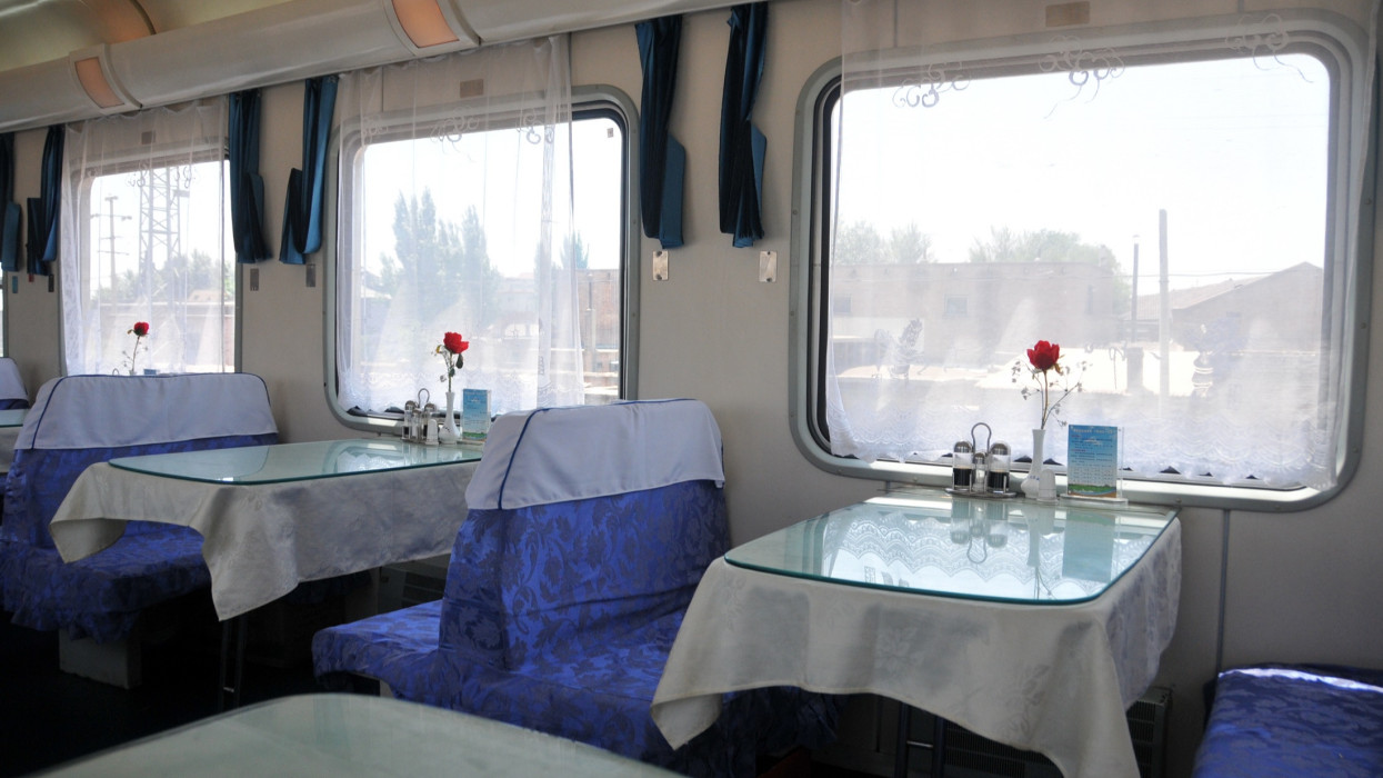 Baotou, Innner Mongolia- June 30, 2012: Batou is an important agriculture and industrial city in west Inner Mongolia. The River Huanghe flows over the city. Here is the dinning car in an express ordinary train in Baotou Railway Station.