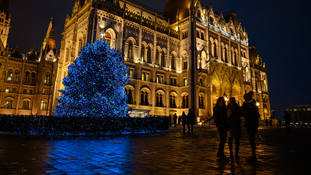 First night of the Countrys Christmas Tree in front of the illuminated Hungarian Parliament Building at Kossuth tÃ©r in the heart of Budapest, capital of Hungary.