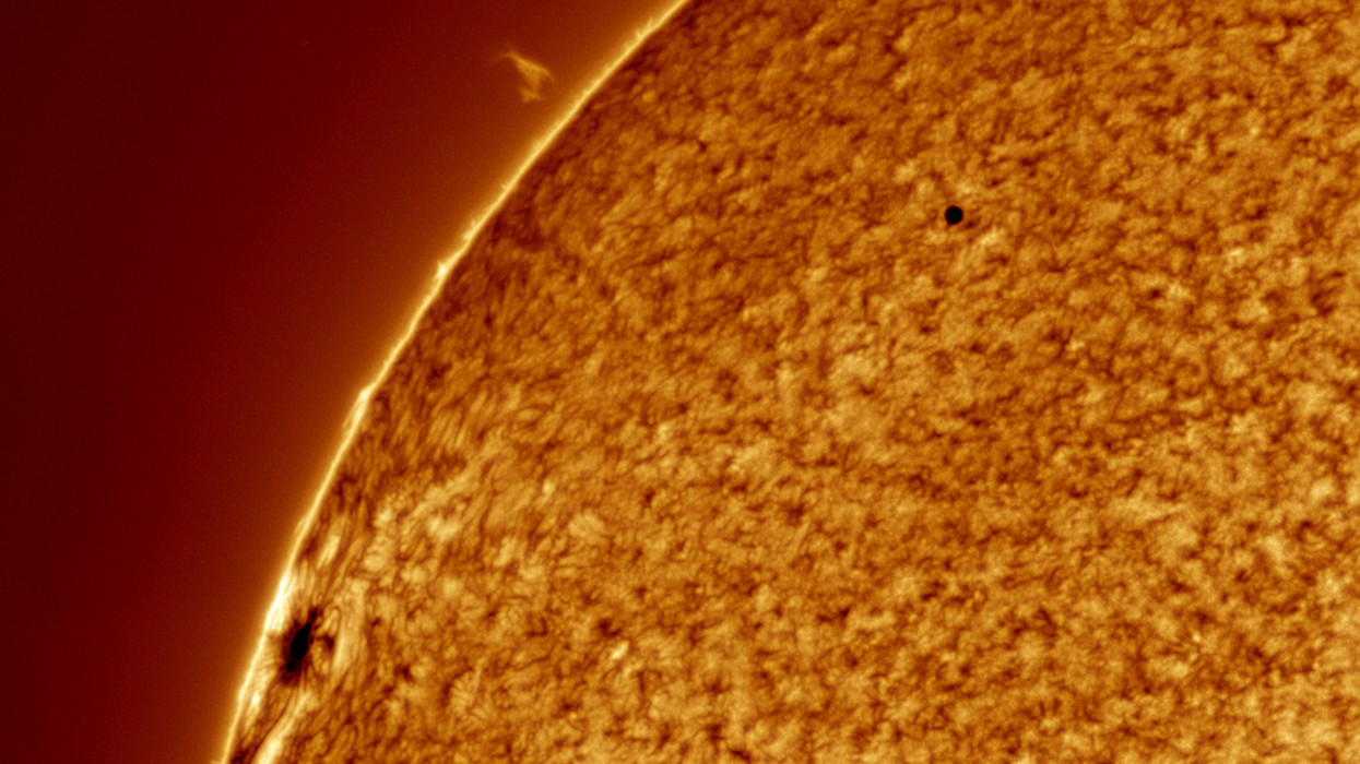 The planet Mercury crosses in front of the sun in this photograph.