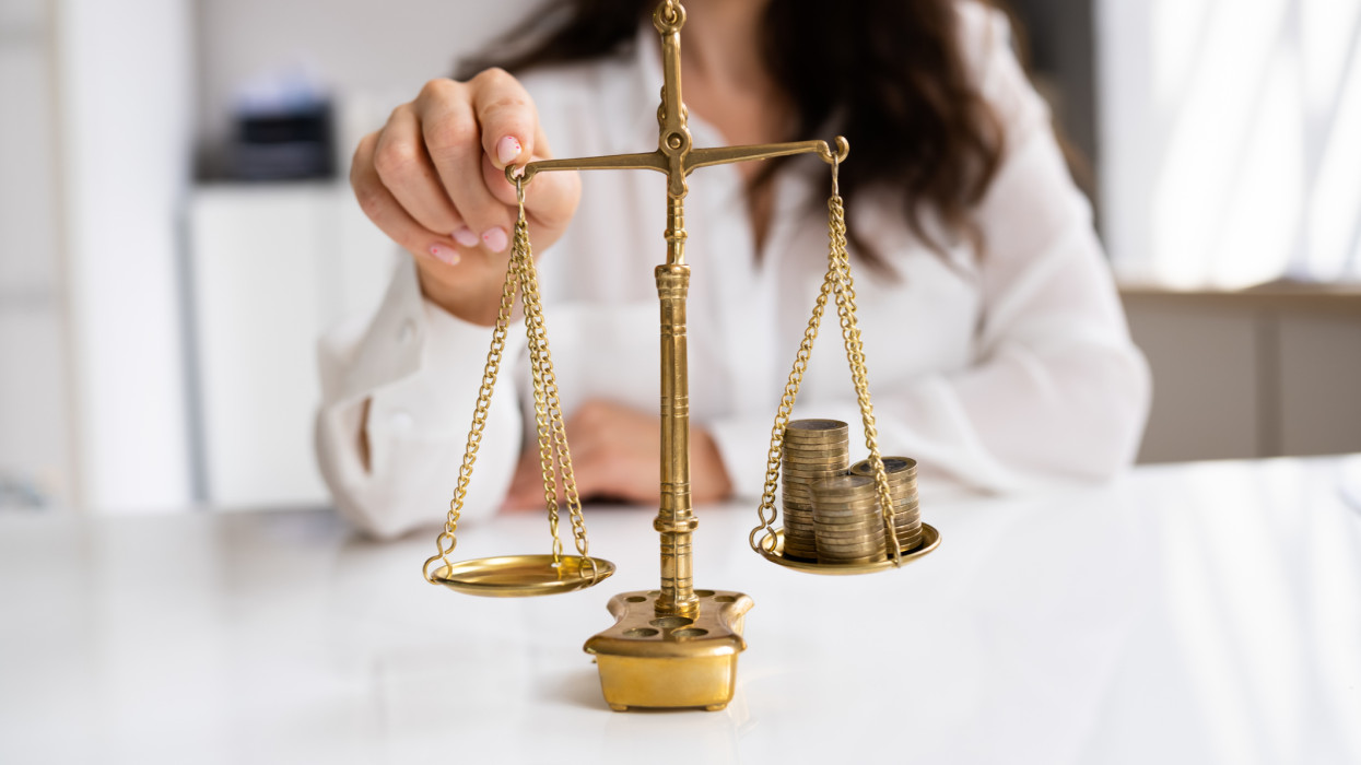 Money And Wealth Balance On Justice Scale
