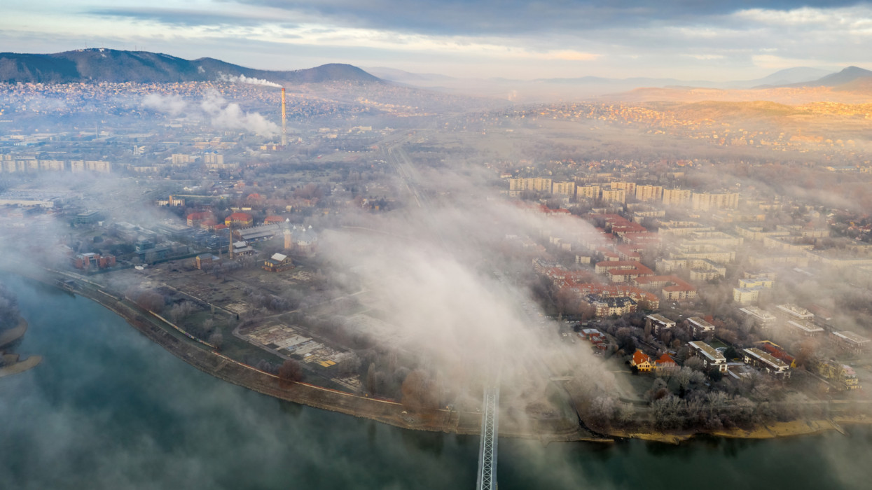Budapest, Hungary - Sunrise over the clouds at Bekasmegyer district and Buda Hills at background at winter time