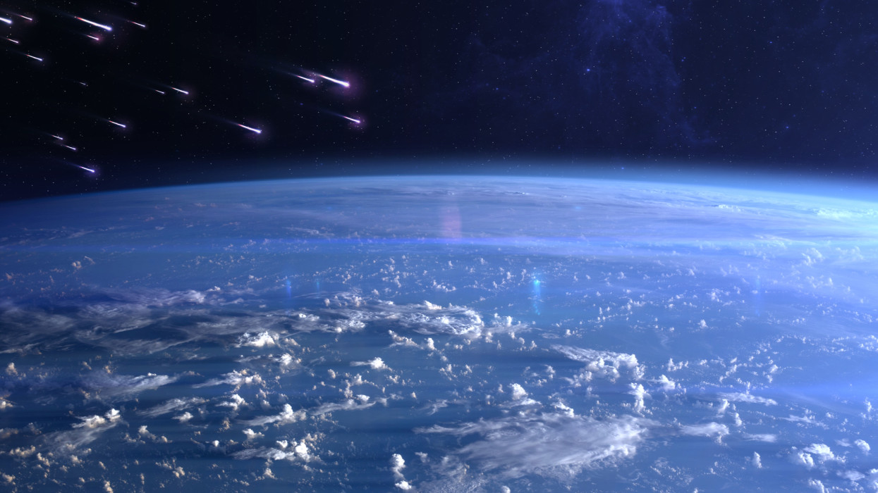 View of planet Earth and meteor shower. Meteor rain and Earth. Quadrantids, Lyrids, Eta Aquariids, Aquariids, Perseids, Orionids, Leonids, Geminids. Elements of this image furnished by NASA. ______ Url(s): https://www.nasa.gov/image-feature/sunrise-across-the-philippine-sea/https://photojournal.jpl.nasa.gov/catalog/PIA17257Software: Adobe Photoshop CC 2015. Knoll light factory. Adobe After Effects CC 2017.