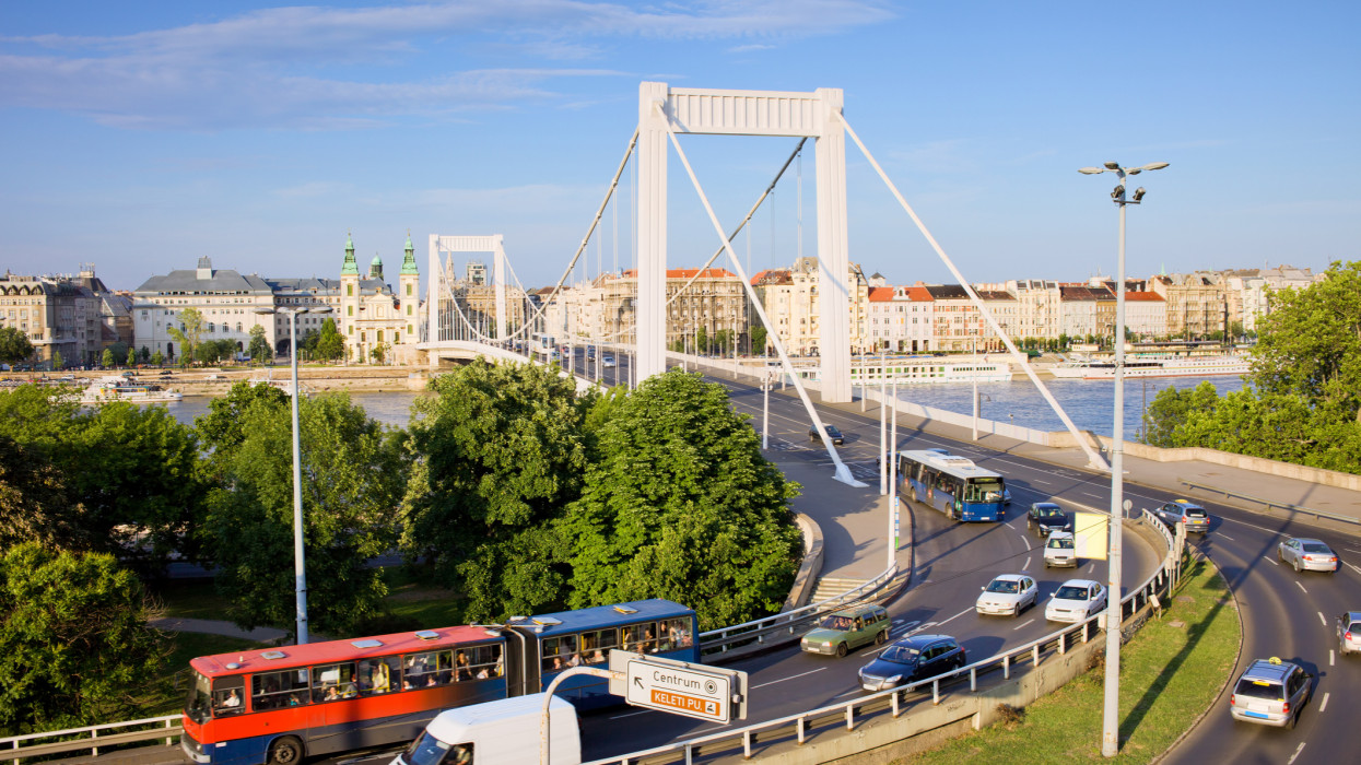 Street traffic and Elizabeth Bridge between Buda and Pest sides of the city, Budapest, Hungary.