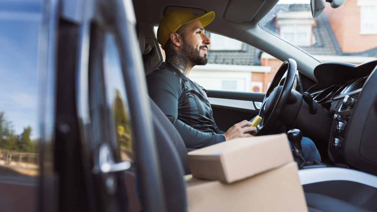 package delivery man, driving, delivery of boxes and merchandise, logistics, small business owner, self-employed