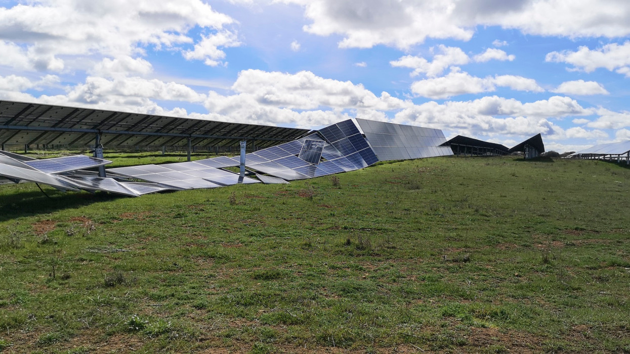 Panoramic shot of photovoltaic power station with solar panels fallen on the ground after a storm. Reinoso de Cerrato, Palencia, Castile and Leon, Spain, Europe
