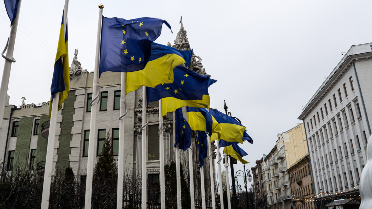 Government building in Kiev with Ukrainian and European Union flags.
