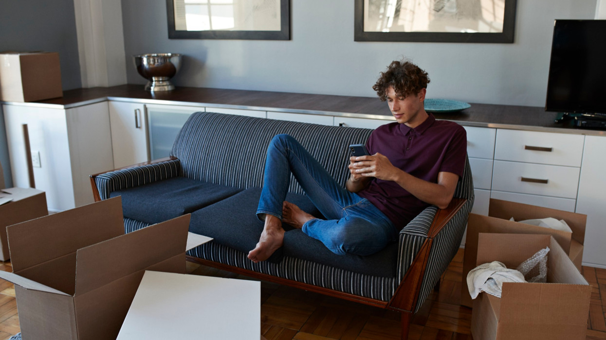 Young people working from home in stylish apartment