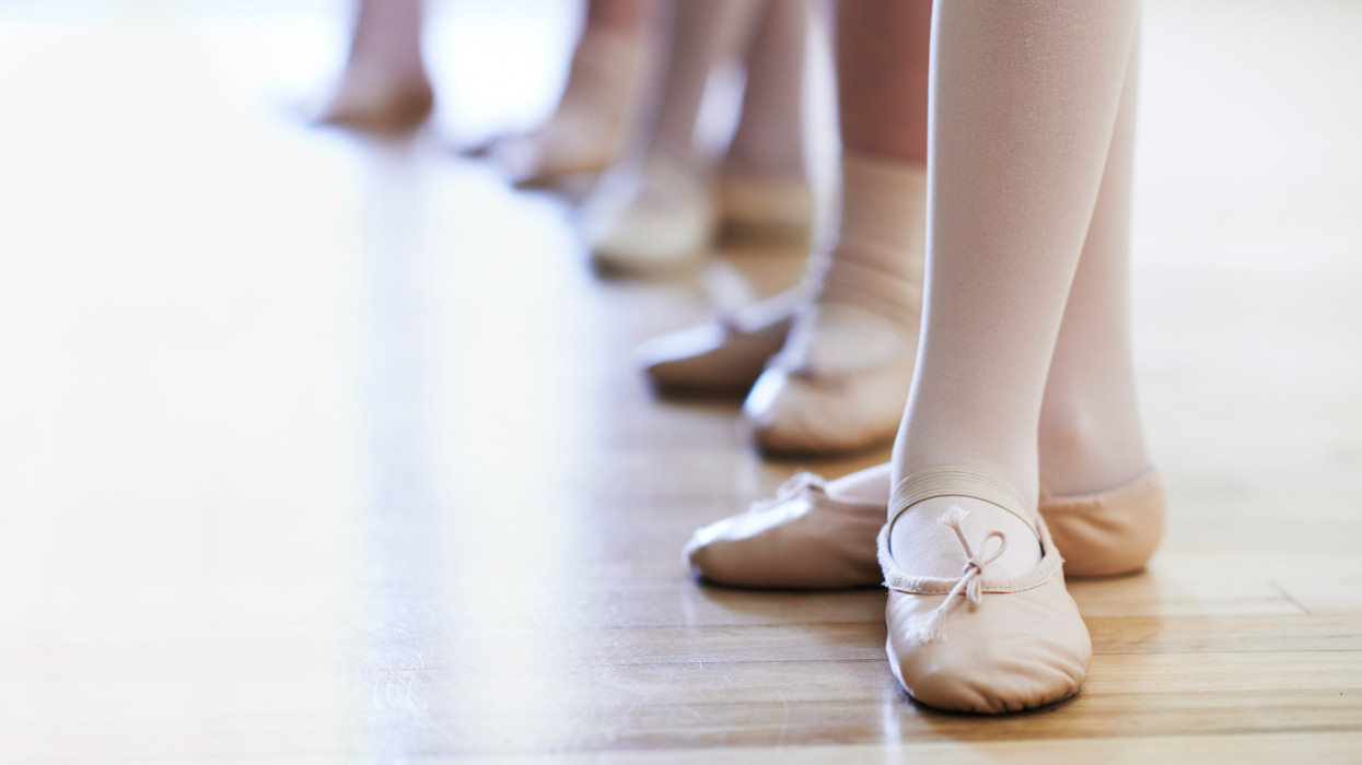 Close Up Of Feet In Childrens Ballet Dancing Class
