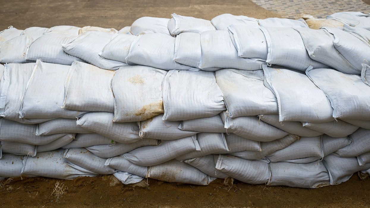 Sandbag to prevent flooding in the rainy season, preventive concept.
