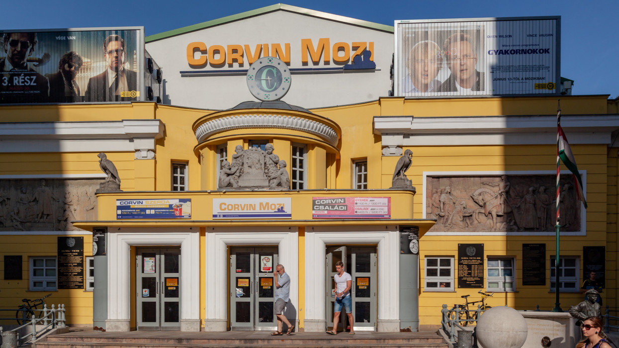 The yellow facade of the Corvin Old vintage cinema facade Budapest