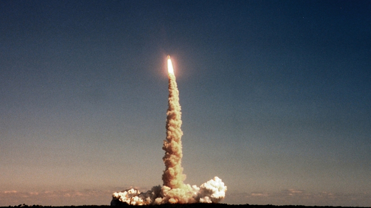 Launch of Space Shuttle Atlantis on mission STS-66 as viewed from VIP site at Kennedy Space Center.