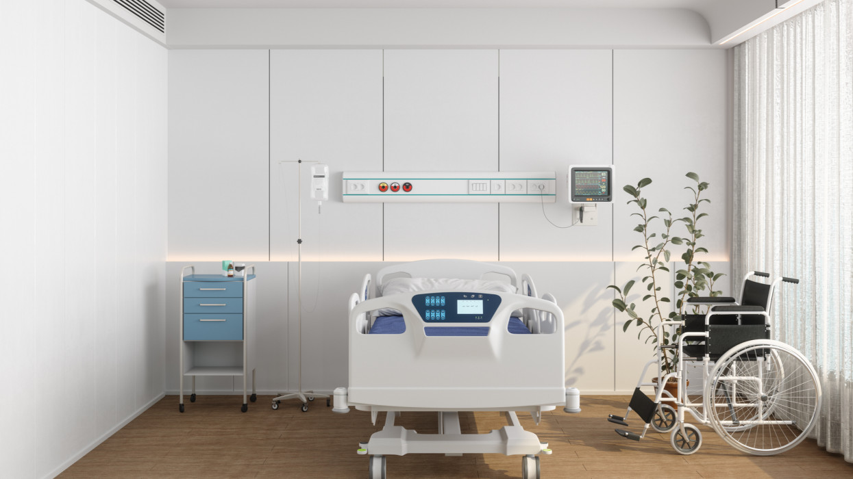 Modern Hospital Room Interior With Empty Bed, Wheelchair, Drawer And Potted Plant