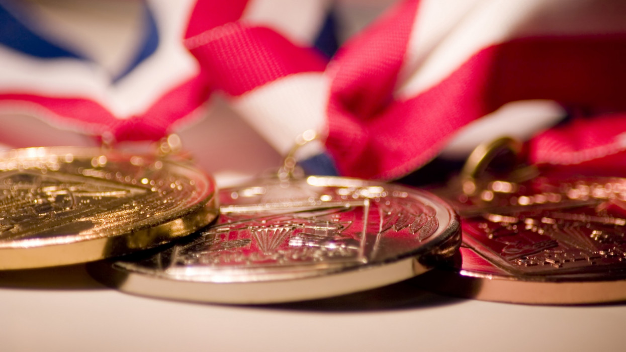 Gold, silver, and bronze medals.