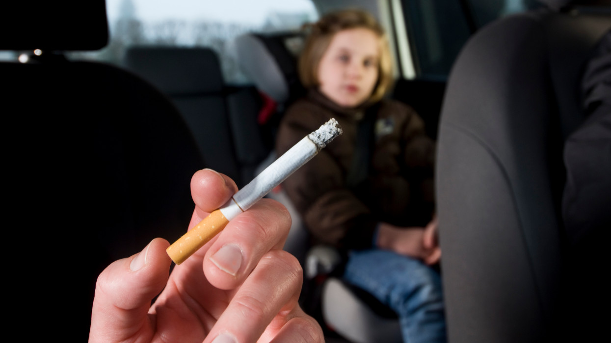 Young child being subjected to the effects of passive smoking from her mothers cigarette.http://i895.photobucket.com/albums/ac158/jameswhittaker_bucket/iStockBanner2011ChildrenMaster.jpg