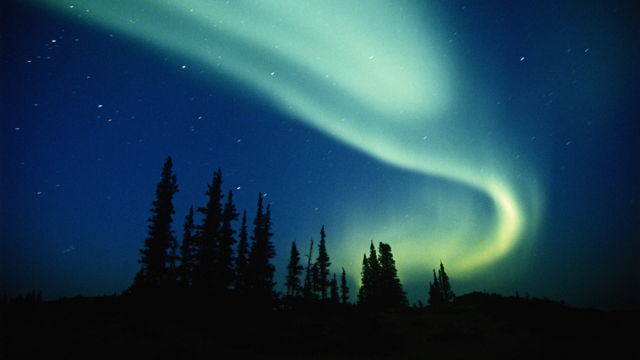 High altitude luminosity.The aurora consists of rapidly shifting patches of light. Extensive displays disturb radio, telephone and telegraph transmission. Auroras have been observed in the atmosphere of other planets, notably Jupiter.