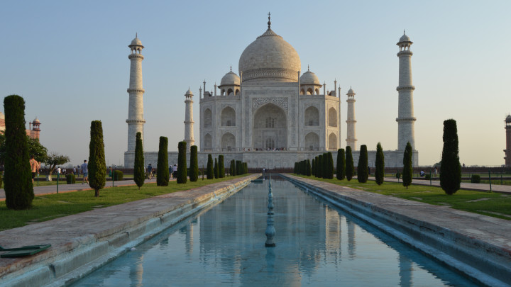 Morning view on the beautiful Taj Mahal at the golden hour while sunrise.