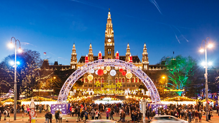 Christmas market on Rathausplatz in Vienna. (with Merry Christmas script in German)